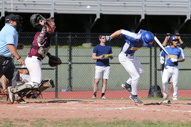 Joe Tardif reacts in pain when a foul ball bounced off of his foot. (Credit: Daniel De Mato)