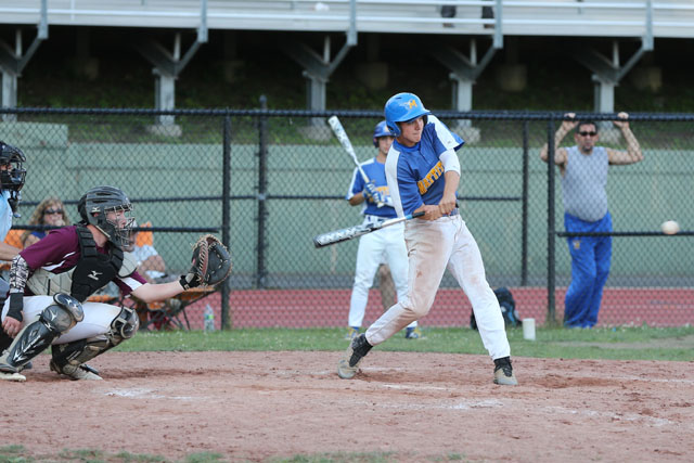 John Dwyer hits an RBI double in the 10th inning to put Mattituck ahead 5-4. (Credit: Daniel De Mato)