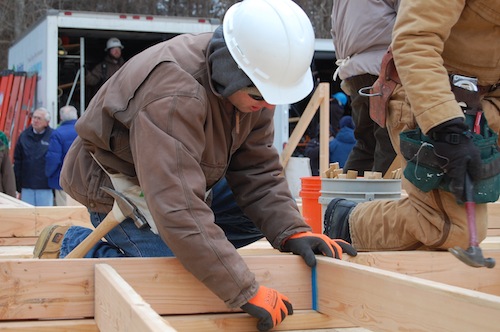 Michael Bredemeyer helps on the construction of his future home. (Credit: Cyndi Murray)