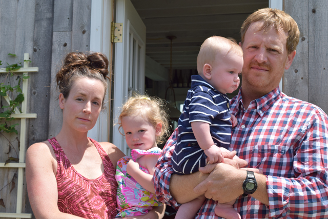 Carey and Regan Meador of Southold Farm + Cellar with their two children, Coralai and Sawyer, outside their Southold tasting barn. (Credit: Vera Chinese)