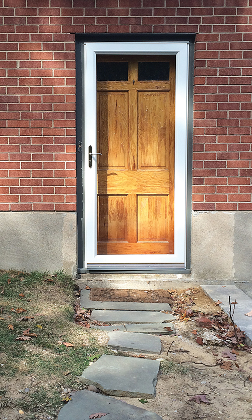 Final step: Hang door. Next on the list: install walkway. (Credit: Joseph Pinciaro)