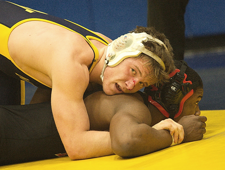 GARRET MEADE PHOTO | Tomasz Filipkowski beat Maleik Henry of Hills East in the semifinals last year of the North Fork Invitational en route to his 170-pound title.