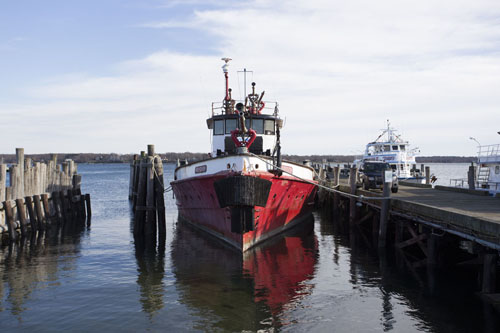 FILE PHOTO | Firefighter still docked in Greenport Harbor despite board's demand for it to relocate.