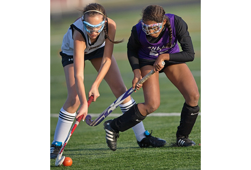 GARRET MEADE PHOTO | Southampton's Ana O'Shaugnessy, left, and Greenport/Southold's Adrianna Chandler pursuing the ball during Monday's playoff game.