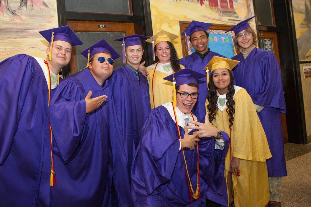 A group of graduates pose before the ceremony.