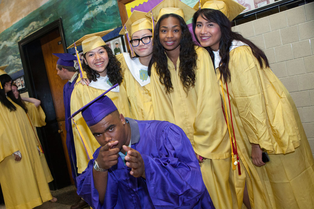 A group of graduates pose before the ceremony.