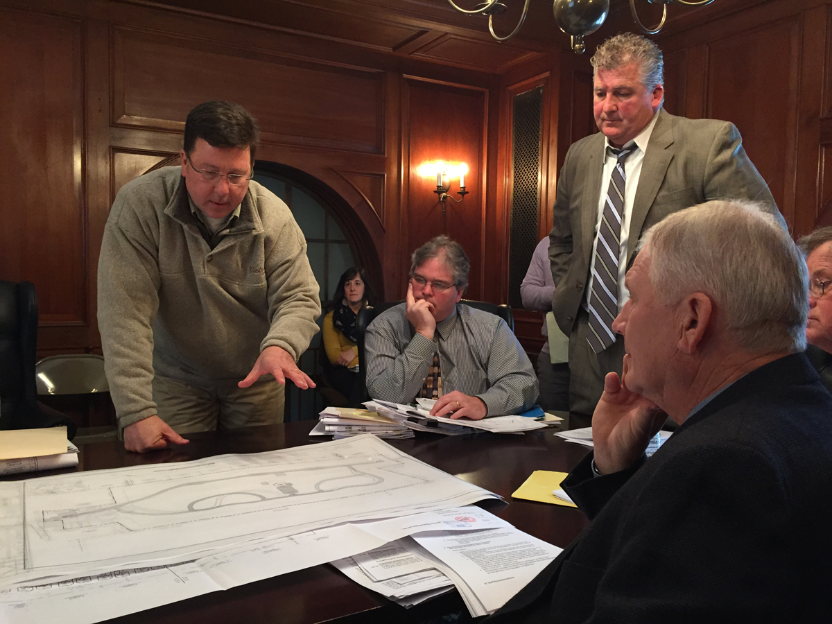 Heritage at Cutchogue architect Charles Kuehn (left) goes over the development's proposal with planning board members at Monday's work session meeting. (Credit: Paul Squire)