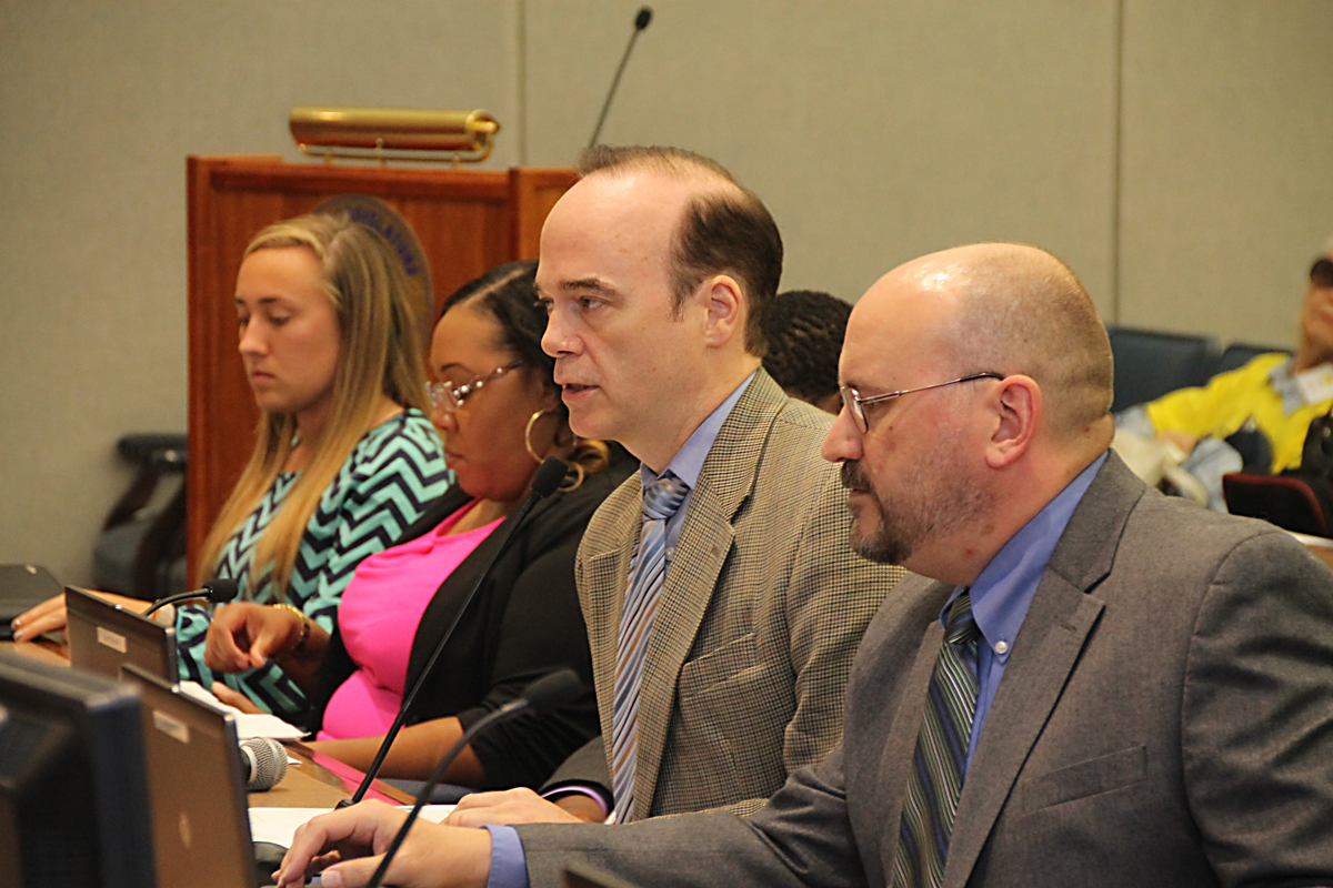 Neal Lewis (second from right) presents a proposed county Climate Action Plan at Tuesday's meeting. (Credit: Paul Squire)