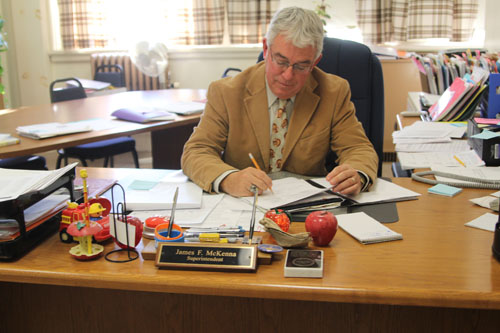 JENNIFER GUSTAVON PHOTO | James McKenna in his office Monday.
