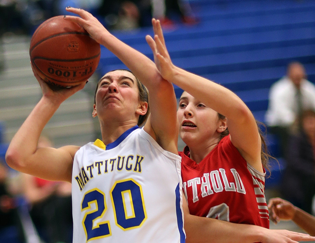 Mattituck's Katie Hoeg, pictured against Southold Monday, scored eight points in the league opening win against Southampton Thursday night. (Credit: Garret Meade)