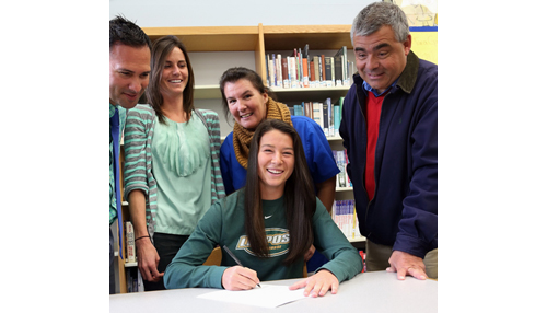 Trish Brisotti signed on to accept an athletic scholarship from C.W. Post. Joining her in the signing ceremony were, from left, Mattituck athletic director Gregg Wormuth, her former coach Julie Milliman, and her parents Kerry and David. (Credit: Garret Meade)