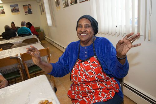 Florence Smith taking a break from serving dinner.