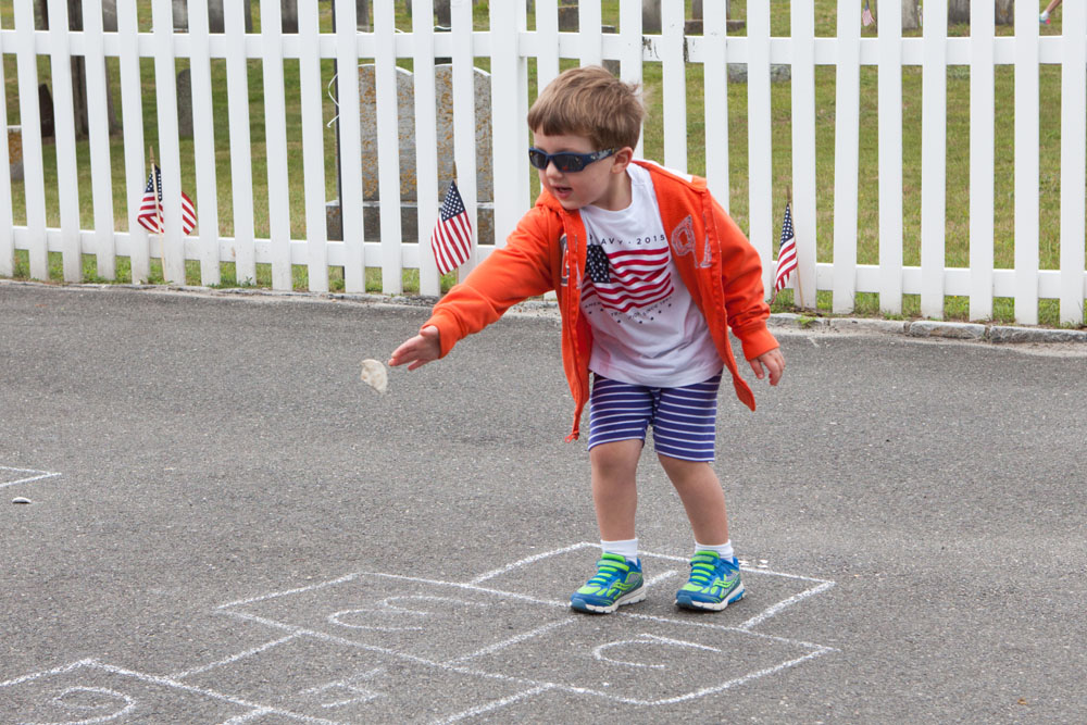 Tony Raynor, 3, of Mattituck enjoying a game of hopscotch.