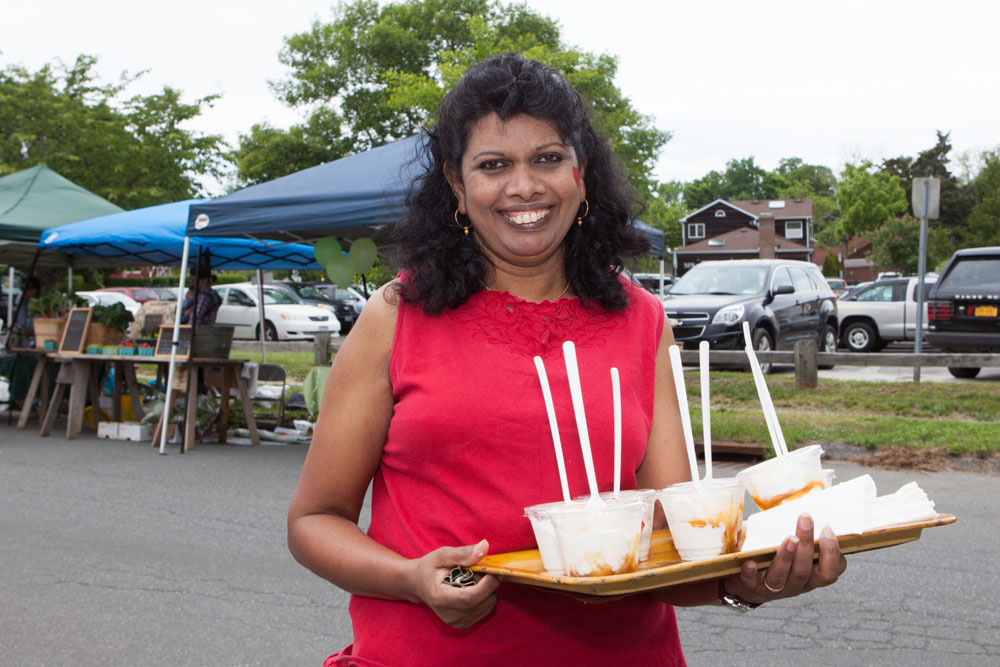 Volunteer Daisy Clasing of Mattituck sells ice cream to raise money.