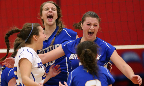 From left, Julia Orlando, Lisa Angell, Emilie Reimer and Meghan McKillop (2) rejoice after the Tuckers capture their fifth county championship in 12 years. (Credit: Garret Meade)