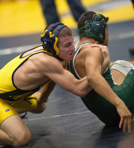 GARRET MEADE PHOTO | Brian Pelan of Mattituck/Greenport, left, putting a hold on Harborfields' Ed Henriquez during the 126-pound final. Pelan won, 6-3.