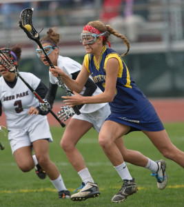 GARRET MEADE PHOTO | Katie Hoeg charging forward before scoring one of her 7 goals against Deer Park.