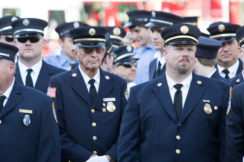The Mattituck Fire Department held a ceremony at the war memorial at Pike Street and Wickham Avenue. (Credit: Katharine Schroeder)