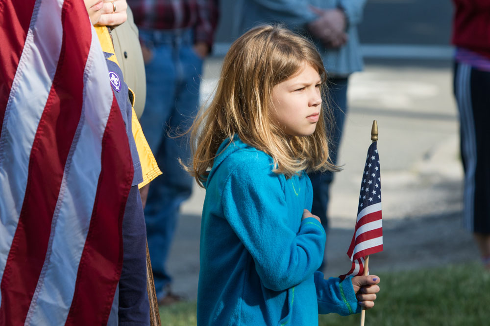 The Mattituck Fire Department held a ceremony at the war memorial at Pike Street and Wickham Avenue. (Credit: Katharine Schroeder)