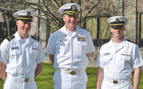 COURTESY PHOTO | Midshipmen Timothy Winters (left) and John Dunne have been appointed officers of the Naval Reserve Officers Training Corps. At center, Captain Matthew Loughlin, USN.