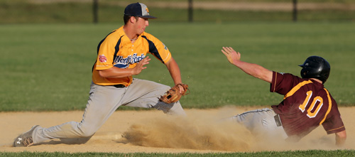 North Fork second baseman Kyle Colletta tags out Riverhead's Tyler Osik, who tried to steal in the seventh inning. (Credit: Daniel De Mato)