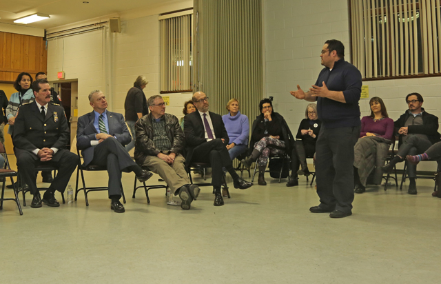 Oscar Cruz of Greenport addresses town officials at Monday night's Synergy Greenport event. (Credit: Krysten Massa)