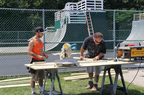 Volunteers help make upgrades to the Greenport Skate Park on Moores Lane Tuesday afternoon. (Cyndi Murray photo)