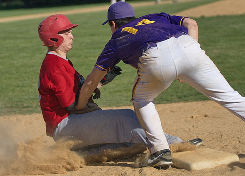 GARRET MEADE PHOTO | Southold's Dillon Engels is tagged out by Greenport's Matt Drinkwater while trying to steal third base in the fifth inning.
