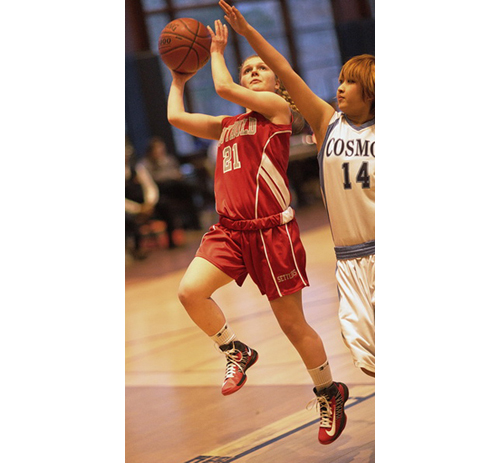 GARRET MEADE PHOTO | Justina Babcock of Southold attempting a layup while The Ross School’s Asuko Saito defends.