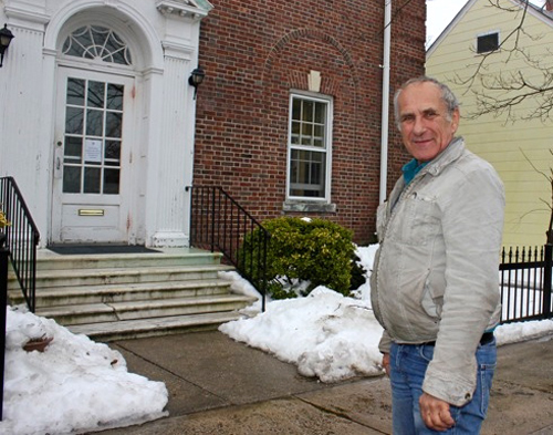 Bill Swiskey states in front of Village Hall. (file photo)