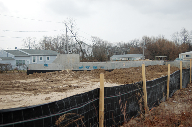 Developer Nick Paleos of Nickart Realty Corp. in Baldwin said the two homes going up along Route 48 near Town Beach in Southold will be finished by July. But they're not for sale. (Credit: Cyndi Murray)