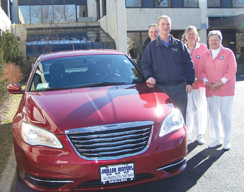 Mullen Motors of Southold and the Eastern Long Island Hospital Auxiliary are teaming up for the seventh annual ELIH Car Raffle, with the winner driving home this brand-new Chrysler 200 or pocketing $10,000 in cash. Bill and Rich Mullen (from left) with raffle co-chairs Pat Rushin and Alice Roggie of the Auxiliary; the car is on display on hospital grounds in Greenport. The winning ticket will be drawn at noon on May 18. For tickets, $50 apiece and limited to 900, leave a message at 477-5463 or visit ELIH.org to download an application.