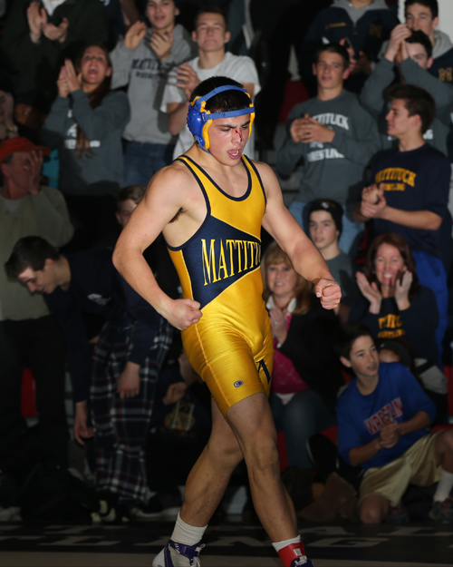 Christian Angelson of Mattituck-Greenport defeated Mike Sweeney of Bayport-Bluepoint in the 170 Lbs weight class. The Suffolk County Division II wrestling championships were held at Center Moriches High School on Feb. 15, 2014. (Photo credit: Daniel DeMato)