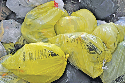 The town recently published an updated brochure on its yellow bag program. (Tim Kelly file photo)