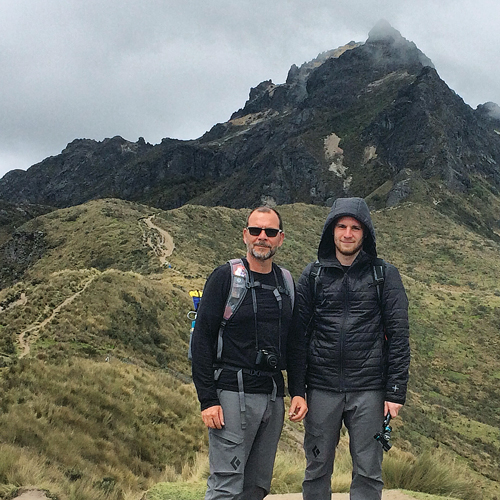Mark Miller (left) and his son Evan standing on Mount Rucu Pichincha in Ecuador. (Credit: Mark Miller)