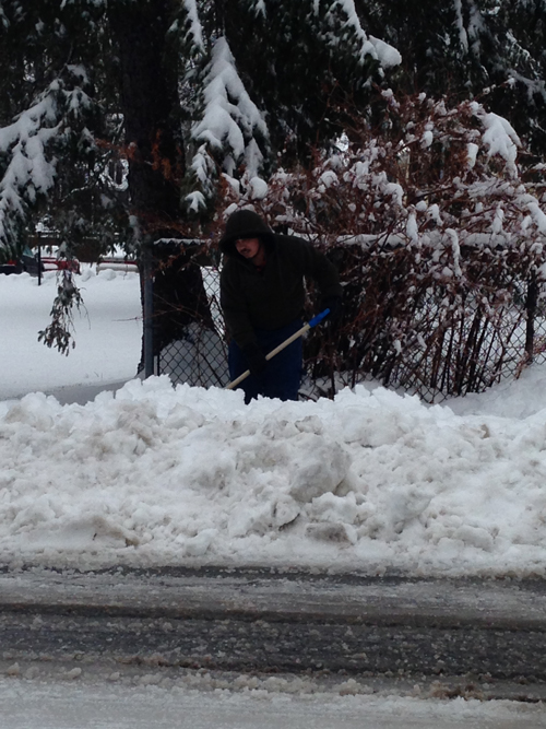 Shoveling along Third Street in Greenport. Cyndi Murray photo.