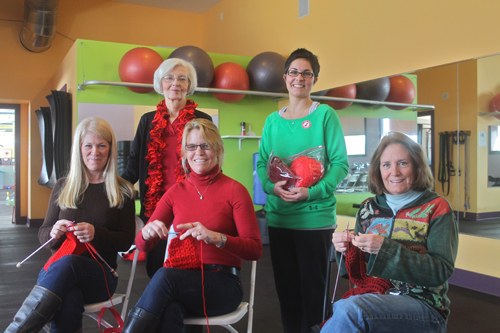 PAUL SQUIRE PHOTO | (L-R) Susan Kaytis, Peggy Sanesky, Jane McGoldrick, Sarah Sirico and Darlene Weaver take part in Sunday's "Knit-In" in Southold.