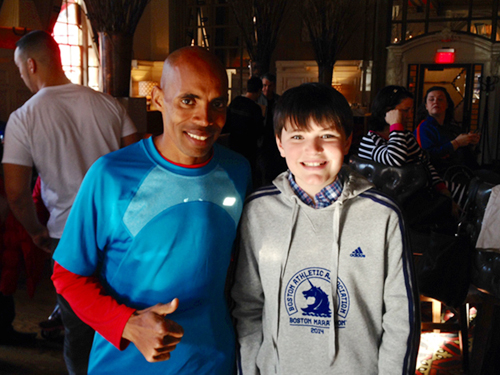 Meb Keflezighi, winner of the Boston Marathon, the night before his historic victory with Liam Adipietro of Shelter Island. (Credit: courtesy)