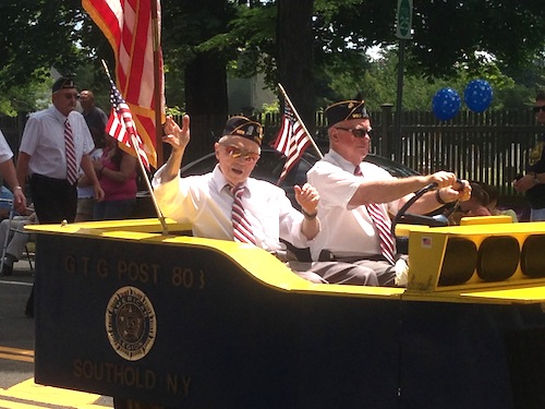 The 2013 Southold Village Merchants Fourth of July Parade featured plenty of sunshine. This year it has been postponed a day due to rain. (Credit: Cyndi Murray, file)
