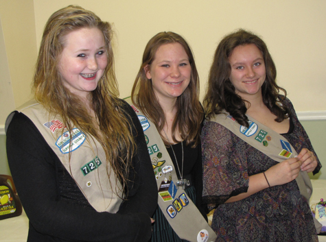 Sarah Fogarty (from left), Emily Gatz and Samantha Kaelin, members of Cadette Troop 725 of Southold, were awarded the Silver Award, Girl Scouting's second highest award, in a ceremony held Jan. 22 at the Southold Town Recreation Center. The scouts were honored for their 'Dog Park Party 2011' project, for which they ran monthly themed gatherings for dogs and their owners at the town dog park on Peconic Lane.