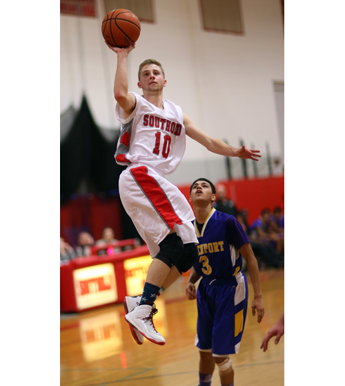 Southold guard Shayne Johnson goes up for a one-handed shot Thursday against Greenport. (Credit: Garret Meade)